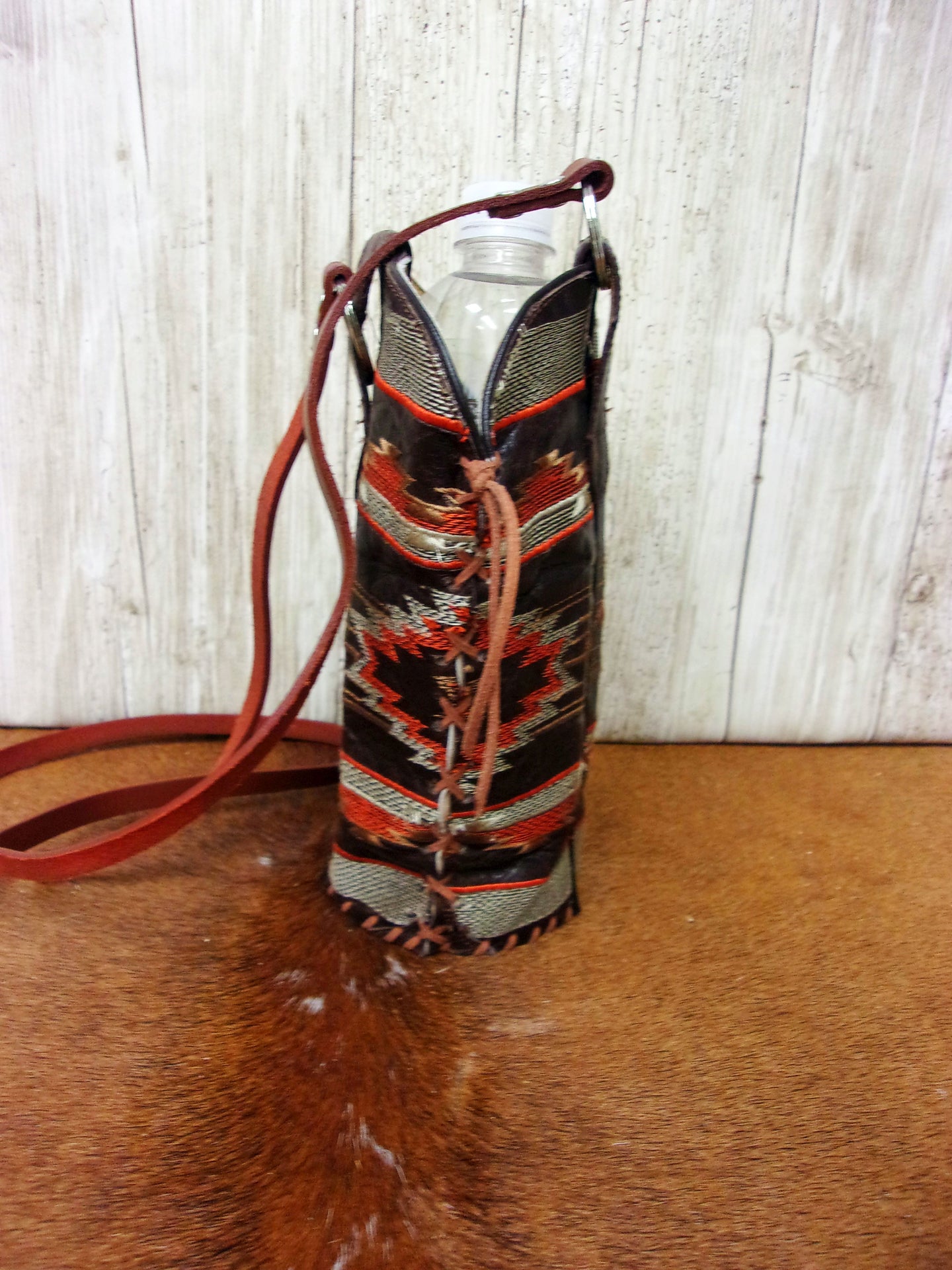 Cowboy Boot Wine Water Tote WA30 handcrafted from cowboy boots. Shop Wine Carrier Bags at ChrisThompsonBags.com and buy the best cowgirl wine tote, leather wine carrier, Leather Wine tote, recycled cowboy boots, unique gift for her, unique gift for him, water bottle caddy, water bottle holder, water bottle tote, western wine carrier, western wine tote, wine lovers gift, Wine Tote at Chris Thompson Bags.